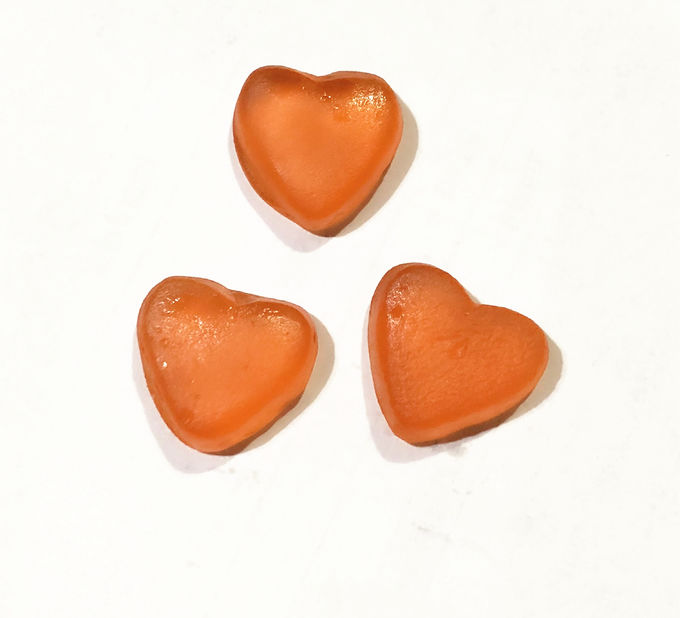 La fragola divertente delle vitamine gommose squisite della frutta ha progettato piccolo 60g a forma di cuore per borsa